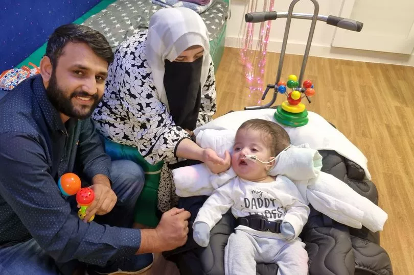 1_Hassan-and-familyjpg